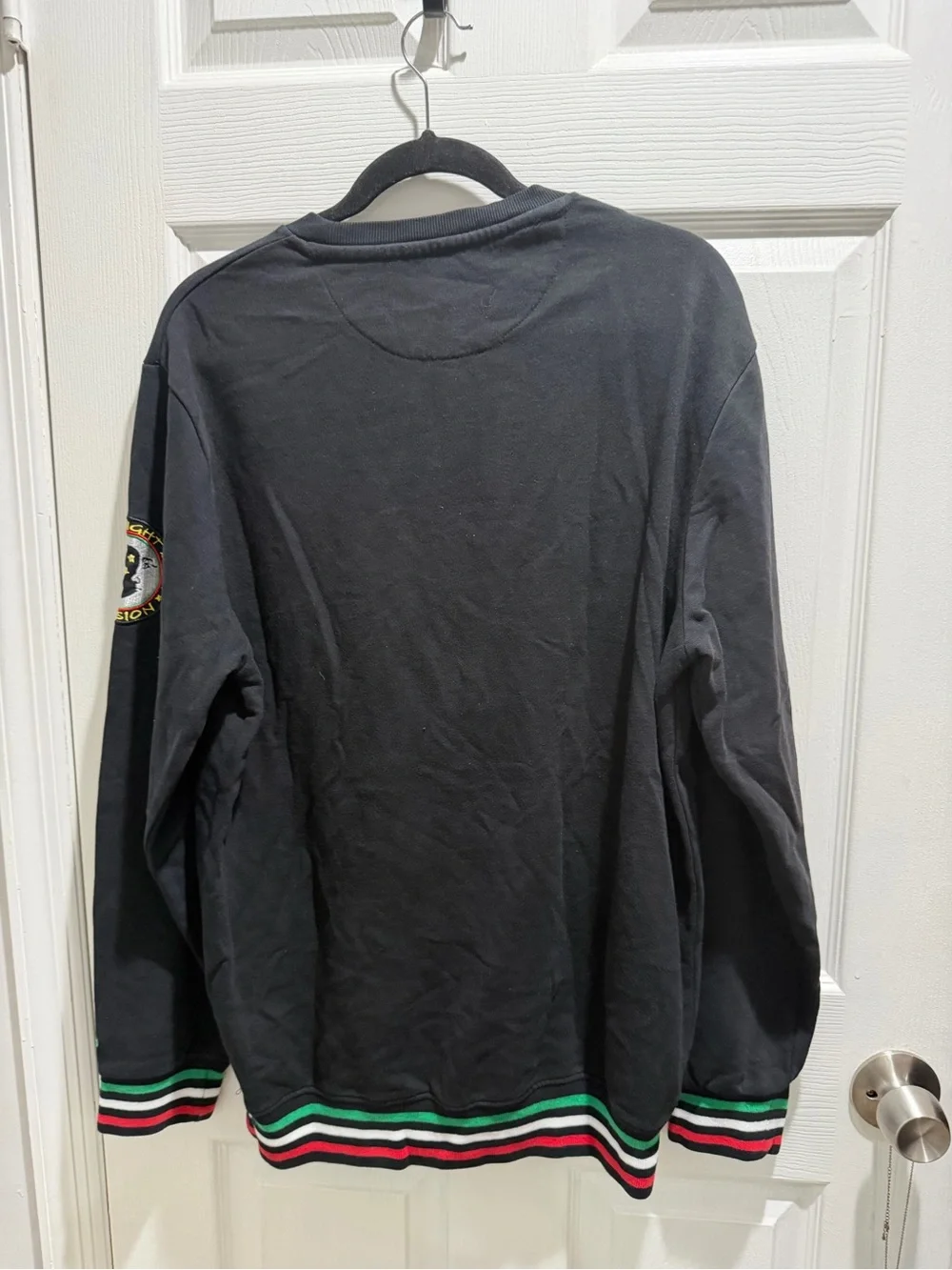 Marauders Black Crewneck Sweater with Striped Hem